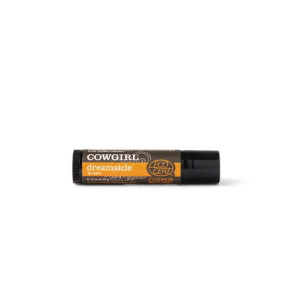 Cowgirl dreamsicle lip blam product laying down on side